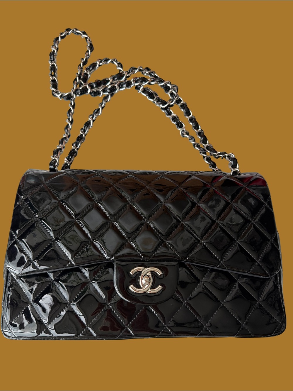 CHANEL Black Quilted Patent Leather Shoulder Bag with Silver Chain